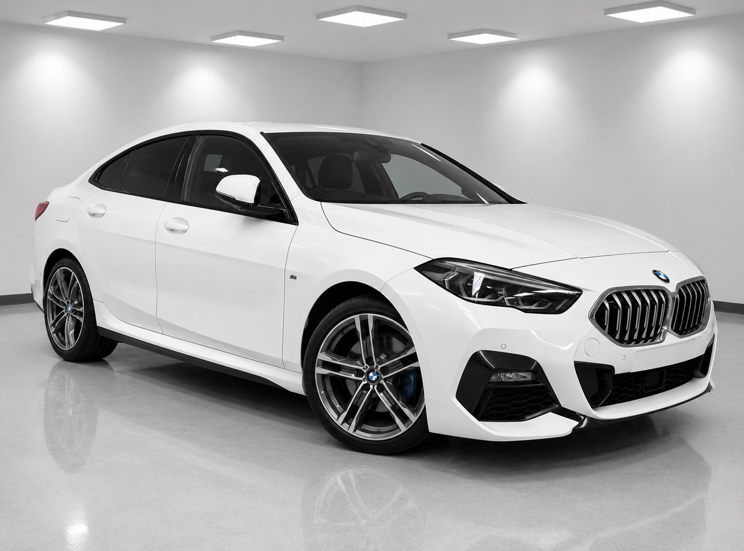 White BMW 218i front view